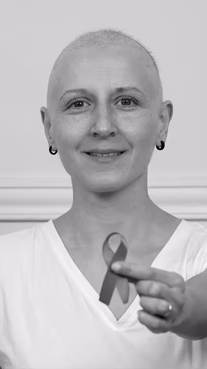 Woman holding cancer ribbon